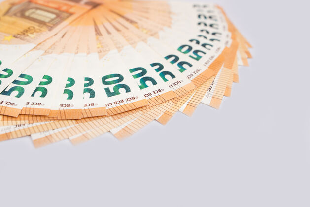 纸币风扇50欧元隔离在白色表面欧元钞票复制空间薪水金融特写