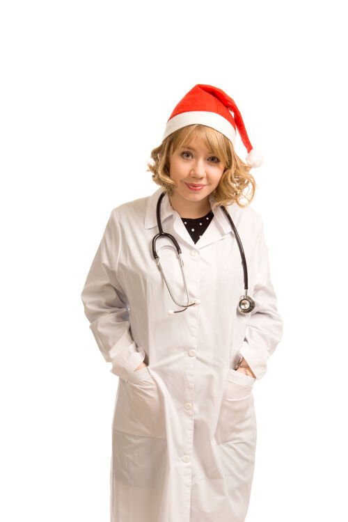 护士带着圣诞帽的医生微笑着准备和医院里的病人一起庆祝圣诞节漂亮微笑医药