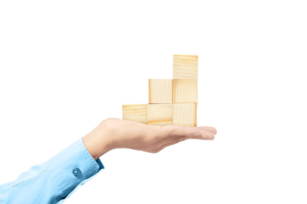 砖块手握成堆的木块玩具隔离在白色背景上持有形状小