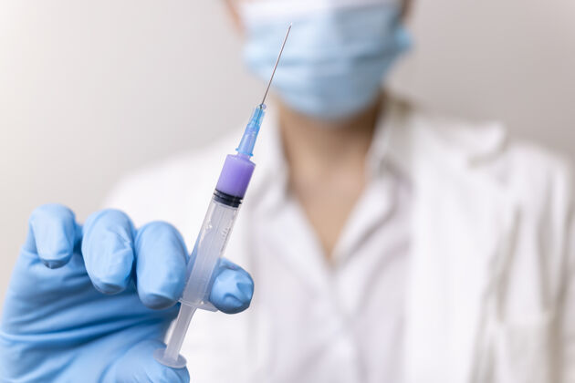 针头接种冠状病毒疫苗一种针对covid-19的疫苗注射预防病毒医疗保健疾病