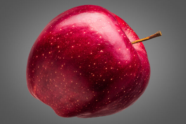 卡路里一个美味的红苹果孤立和闪亮的倒影苹果甜健康