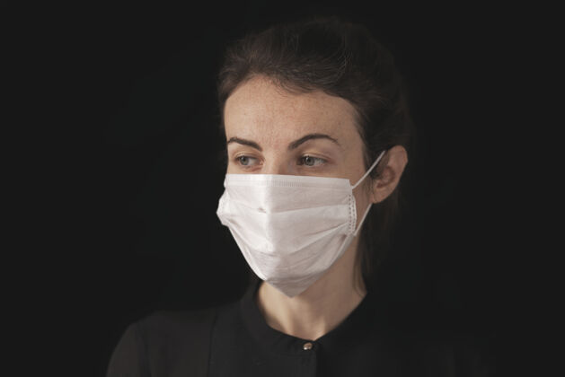 流行一个戴着冠状病毒面具的女人女性爆发疾病
