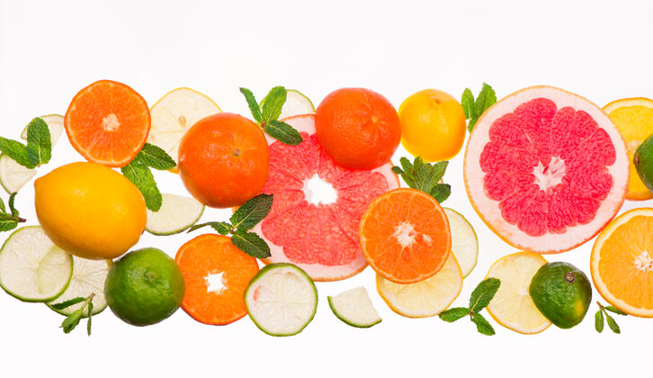 木材柑橘背景新鲜柑橘类水果-柠檬 橙子 酸橙 葡萄柚的白色背景半成熟切片