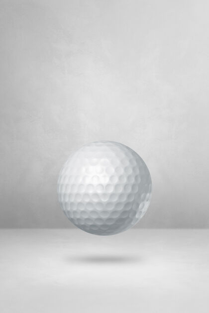 球体白色的高尔夫球被隔离在一个空白的工作室背景上高尔夫经典设备