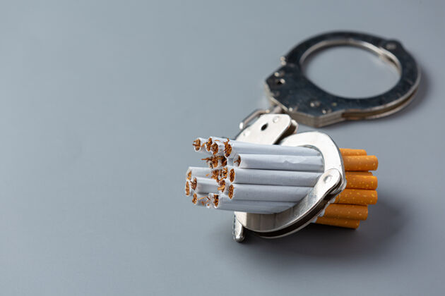 康复黑暗表面上的香烟世界无烟日概念预防吸烟解决