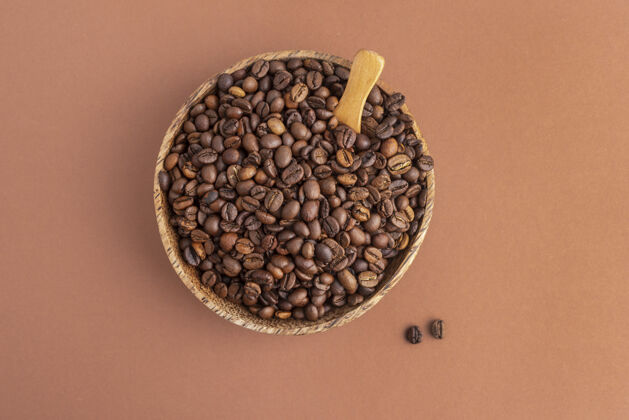 咖啡咖啡豆顶视图碗碗平放木勺