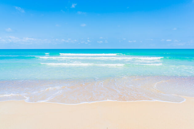 海滩美丽的热带海滩海洋白云蓝天背景旅游度假岛屿海洋自然