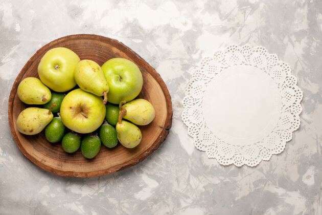 饮食顶视图新鲜水果苹果飞珠和梨在一个白色的空间农产品异国情调顶级