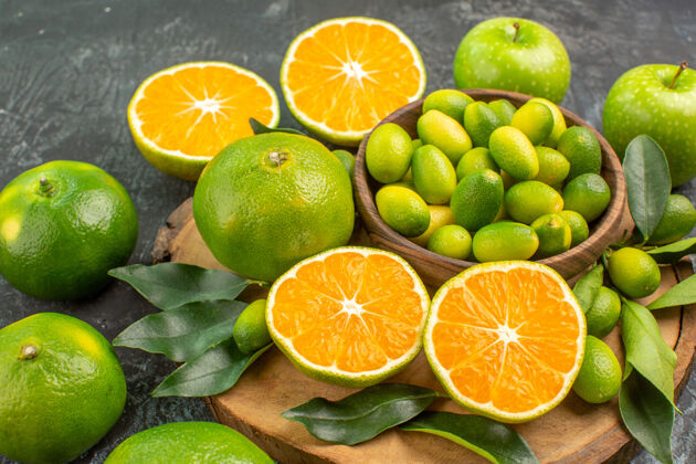 壁板侧面特写查看柑橘类水果开胃柑橘类水果上的砧板青苹果柑橘板切片