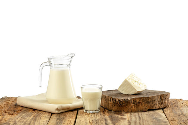 配料不同的奶制品 奶酪 奶油 木桌和白墙上的牛奶健康的饮食和生活方式 有机的天然营养 饮食美味的食物和饮料洞美食勺子