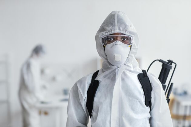 病毒人们一起消毒危险区域控制冠状病毒防护服