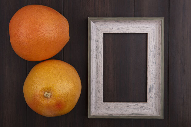 水果顶视图复制空间橙色与灰色框架木制背景视图复制木材