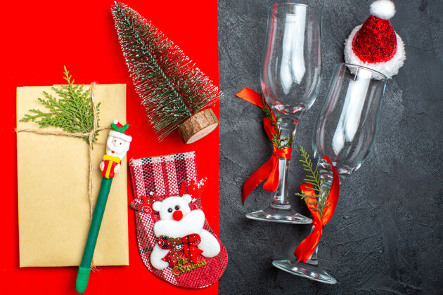 刷子顶视图美丽的礼物圣诞树数字圣诞老人帽子上的红色和黑色背景圣诞书签酒精