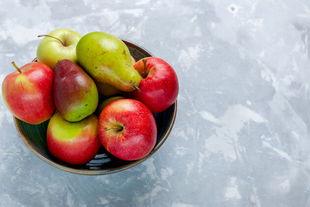 醇香前视新鲜水果苹果芒果浅白书桌上水果新鲜醇厚成熟树照片可食用吃苹果桌子