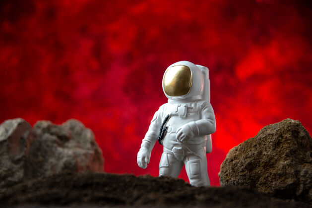 观众前视图白色宇航员与月球上的岩石红色科幻幻想宇宙幻想灯光摇滚