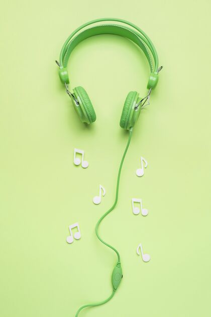 创意绿色耳机和白色音符音乐耳机视图