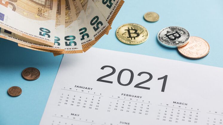 硬币2021年的日历与纸币和硬币的安排钞票货币经济
